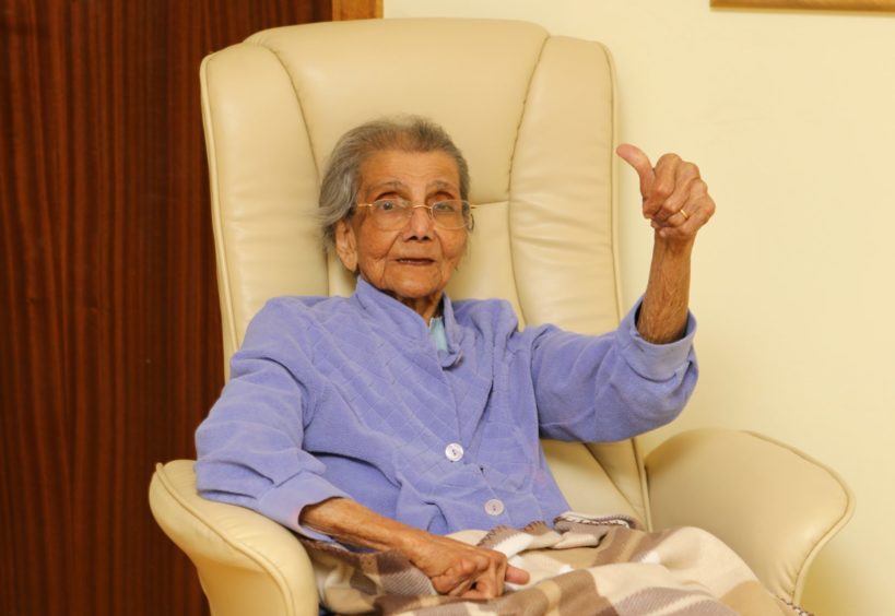 Daphne Shah giving thumbs up sign