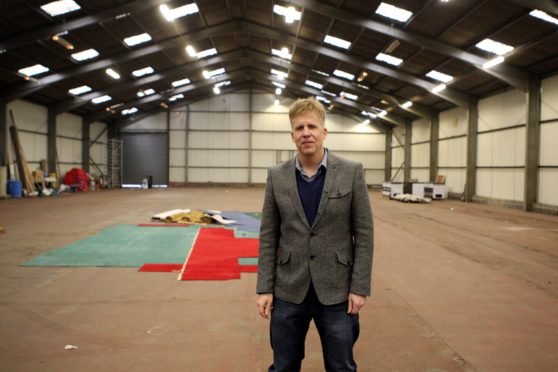 Fergus Storrier at one of the units at Manhattan Works, before it was set up.