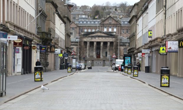 A deserted Reform Street in Dundee. It has been claimed allowing a certain section of the population out of lockdown would benefit the economy.