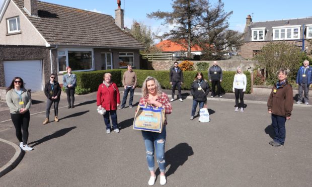 Kelly Christie of Voluntary Action Angus with the rest of the helpers delivering shopping to people in Montrose.