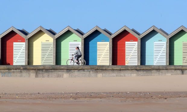 A cyclist takes some exercise at Blyth beach near Whitley Bay in Northern England as the UK continues in lockdown to help curb the spread of the coronavirus. PA Photo. Picture date: Monday April 6, 2020. See PA story HEALTH Coronavirus. Photo credit should read: Owen Humphreys/PA Wire