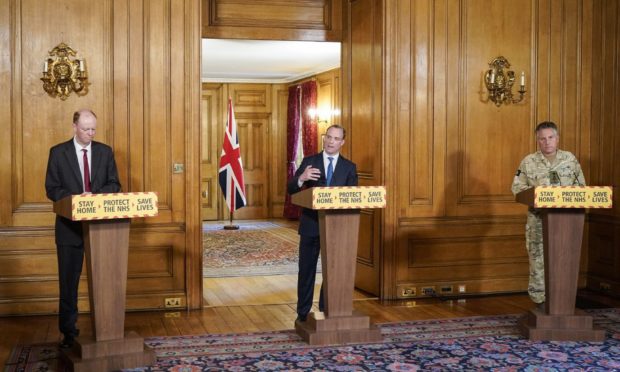 Left to right: Chief Medical Officer for England Chris Witty, Foreign secretary Dominic Raab and Chief of the Defence Staff General Sir Nick Carter.