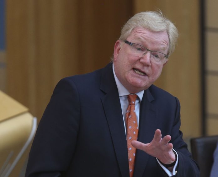 https://wpcluster.dctdigital.com/thecourier/wp-content/uploads/sites/12/2020/04/Jackson-Carlaw-MSP-First-Ministers-Questions-FMQs-Scottish-Politics-Coronavirus_35265348-e1590432223834-695x564.jpg