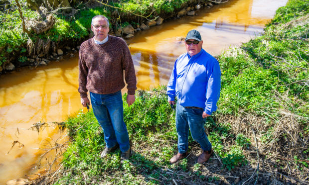 Stewart Grieve, chairman of the River Leven Angling Club, left, and Mr McGlashan.