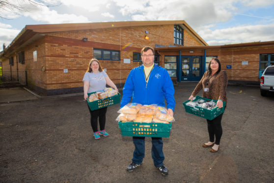 Laura Anderson, Jon Kidd and Sam Skelton of Letham4All with the donations. Picture: Steve MacDougall.