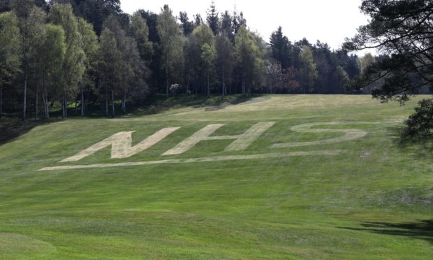 An eye-catching NHS tribute at Blairgowrie - and clubs like Thornton are also doing their bit.