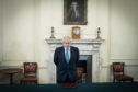 Prime Minister Boris Johnson observes a minute's silence.