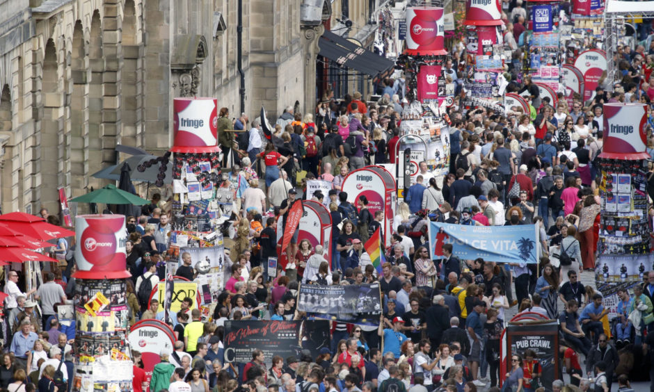 Fringe crowds on Edinburgh's Royal Mile.