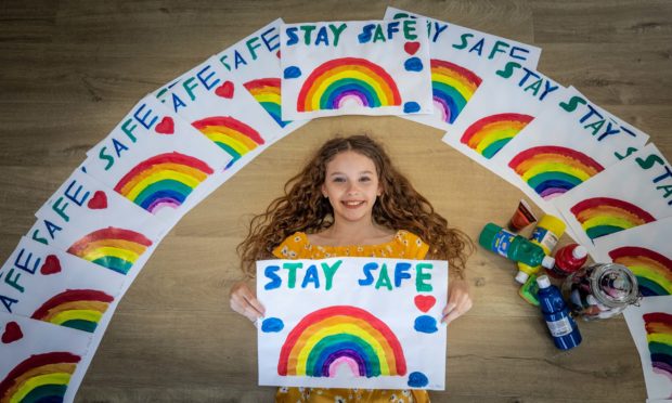 11 year old Maci Fotheringham has been painting rainbows as support for NHS while fundraising for Benarty Foodbank. But many people