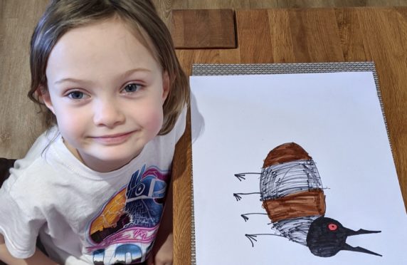 Roni Lemon, aged six, from Dundee, with her drawing of a bug.