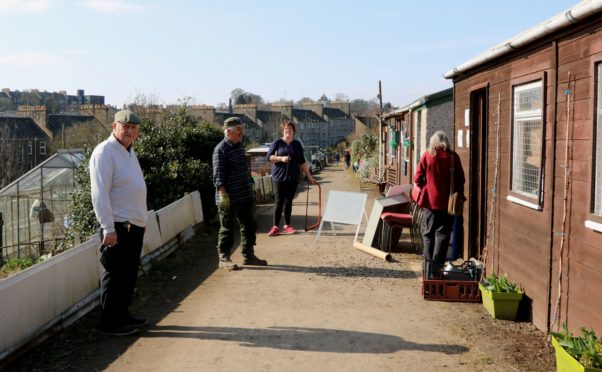 Social distancing queue at the allotments shop