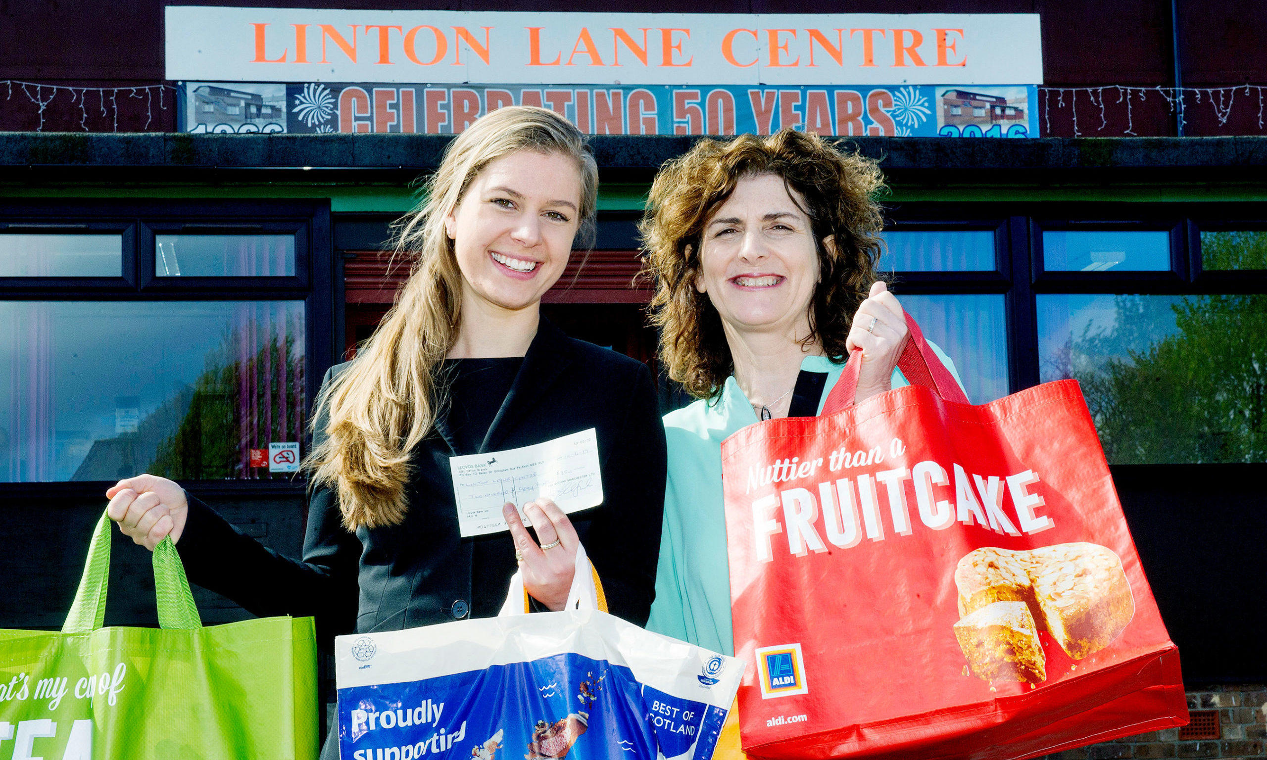 Mandy Henderson, right, with Harriet Morse from Aldi during a previous fundraising effort.