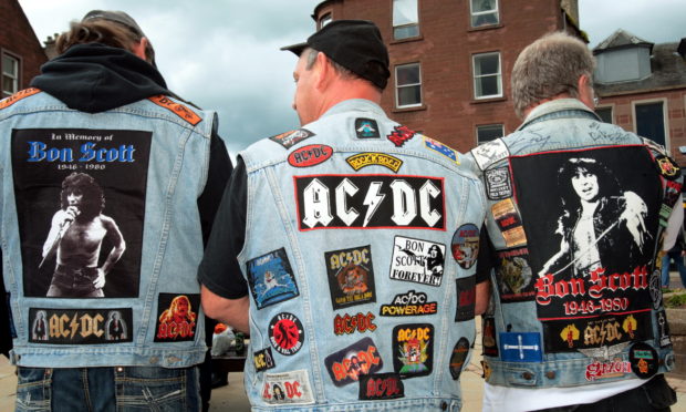 Fans celebrating AC/DC at Bonfest in Kirriemuir.