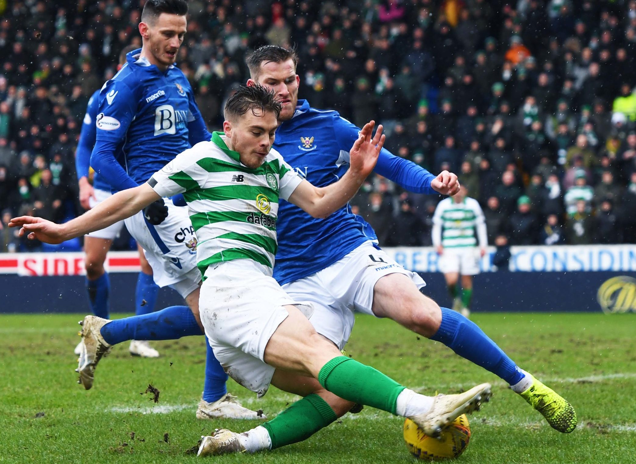 Jamie McCart tackles Celtic's James Forrest in a game last season.