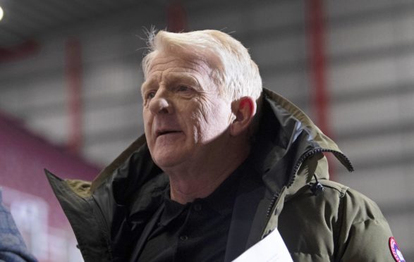 Gordon Strachan is loving his work at Dens Park.