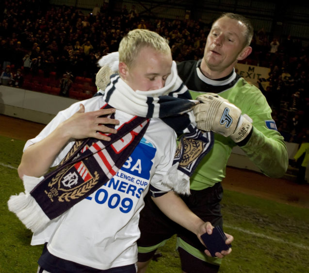 Leigh Griffiths and Rab Douglas celebrate 2009 Challenge Cup triumph with Dundee.