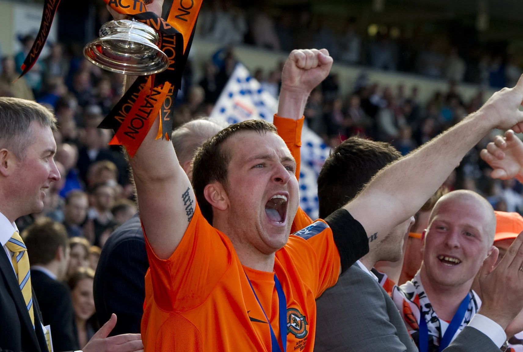 Andy Webster lifts the Scottish Cup at Hampden.