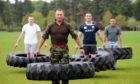 Grant Ryrie, Norman McConnachie, from Storm Leisure Military Fitness, Chris Simpson and Andrew Mewse will be part of a team of 20 who will carry a 68-kilo tractor tyre from Holburn Bridge to Peterculter to raise funds for the Deeside Forget-Me-Not charity.
