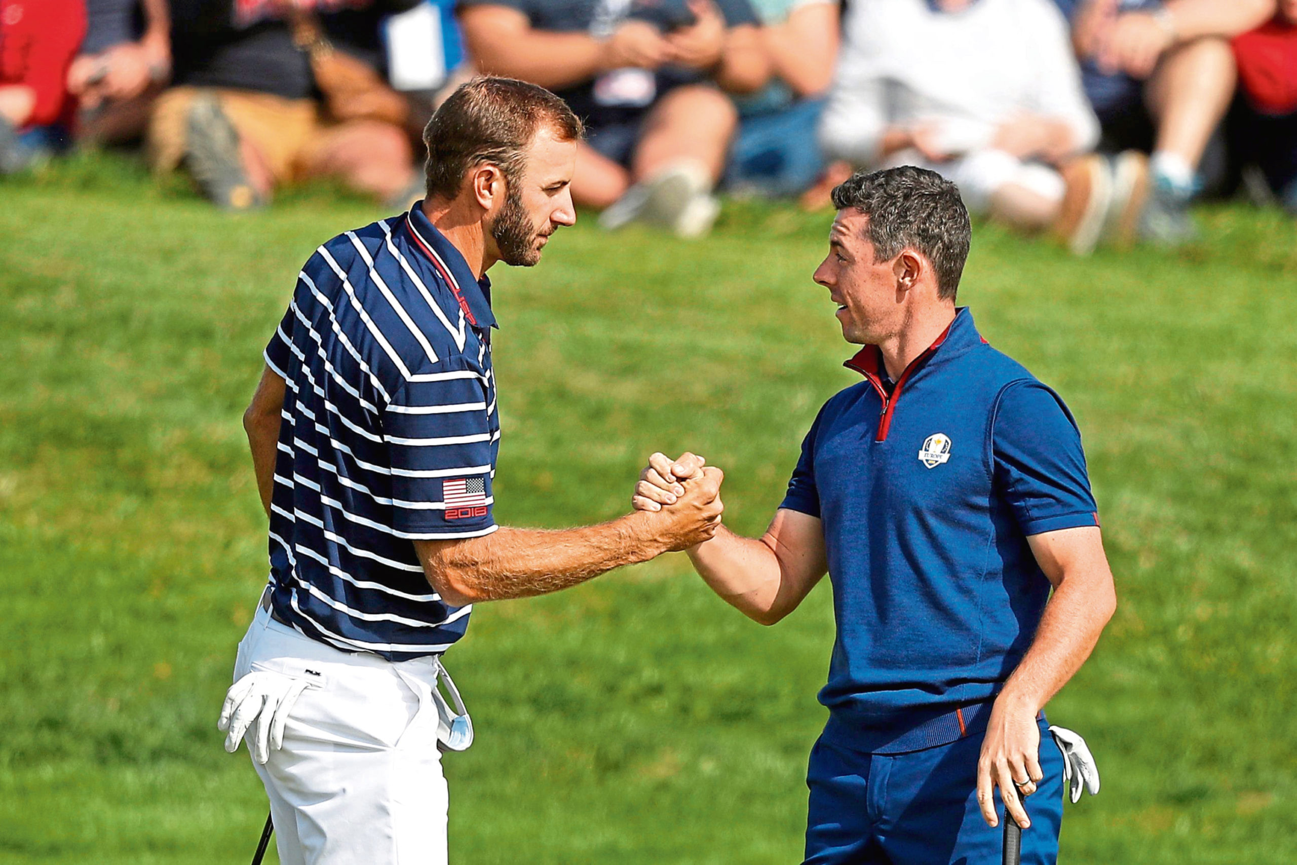 Mandatory Credit: Photo by Alastair Grant/AP/Shutterstock (10634055a)
Dustin Johnson left, and Rory McIlroy shake hands on 16th green at the end of a fourball match on the opening day of the 42nd Ryder Cup in Saint-Quentin-en-Yvelines, outside Paris, France. Johnson and McIlroy headline a $3 million charity match for COVID-19 relief that will mark the first live golf on television since the pandemic shut down sports worldwide. The May 17 match will be played at Seminole Golf Club in South Florida
Seminole Match Golf, Saint-Quentin-en-Yvelines, France - 28 Sep 2018