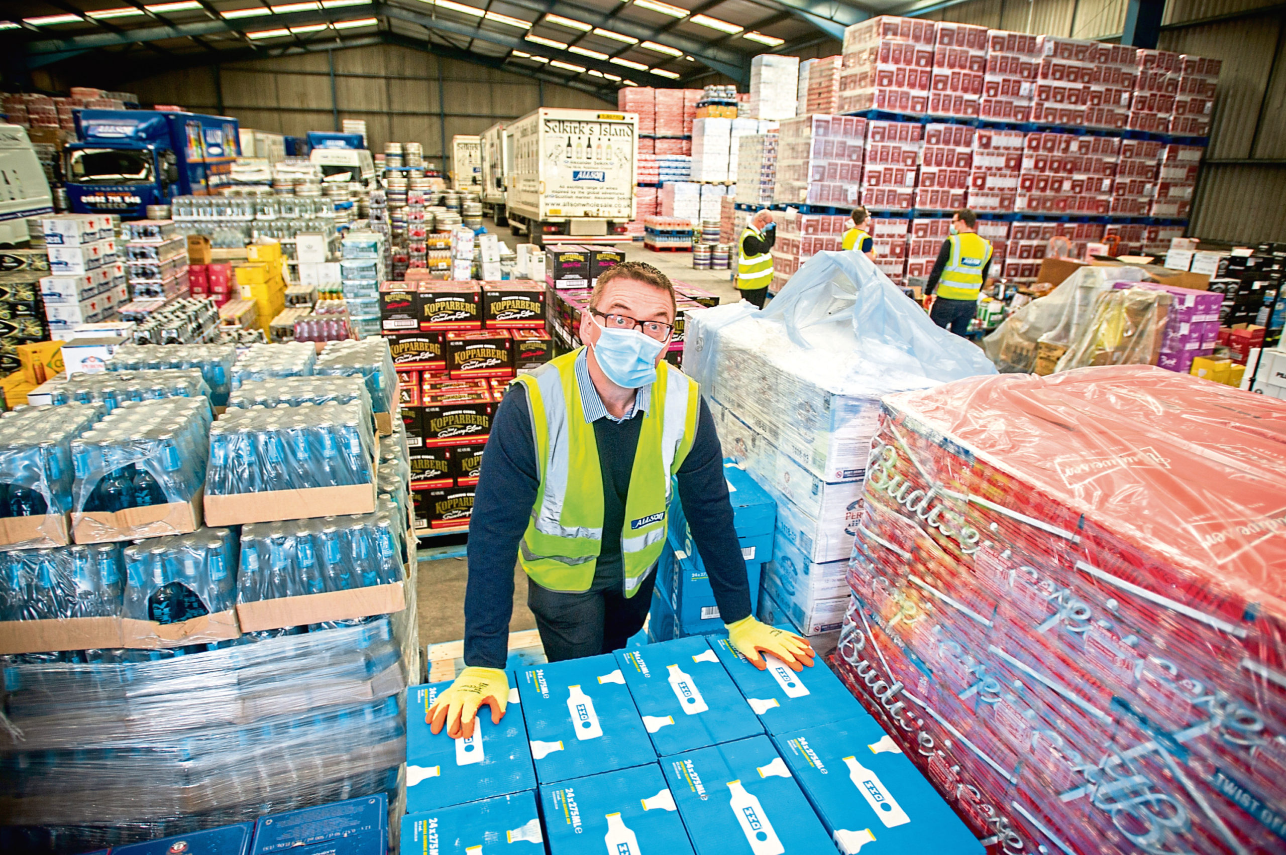 Allson Wholesale managing director Colin Drysdale with some of his alcohol stock.