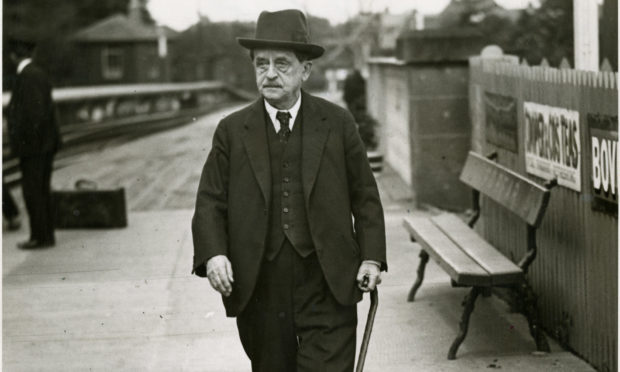 Sir James Matthew Barrie on the platform at Forfar Station in 1933.