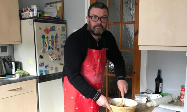 Graeme 'Beef' Cunningham at work in the kitchen