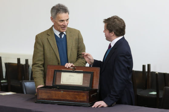 Bonhams Scotland managing director Charles Graham-Campbell and senior valuer Hamish Wilson at Culloden in 2019