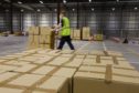 Boxes of food ready for distribution at the Michelin Plant in Dundee.