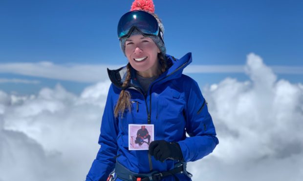 Kirsty Mack at the top of Mount Elbrus in Russia