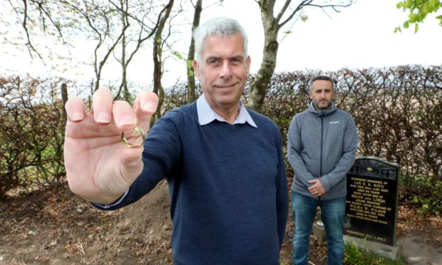 Cllr Brian Boyd was visiting his father Ian,s grave in the Panbride Old Parish church, Carnoustie, when he lost his wedding ring,which was found by Grant Downie of Angus Council parks dept.