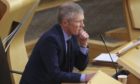 MSPs voted to back a Liberal Democrat led motion to reform the Scottish Qualification Authority and Education Scotland.