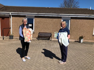 Forfar Inner Wheel member Susan Oliphant delivering bags to June McCarroll, manager at Windyedge Care Home, Forfar.