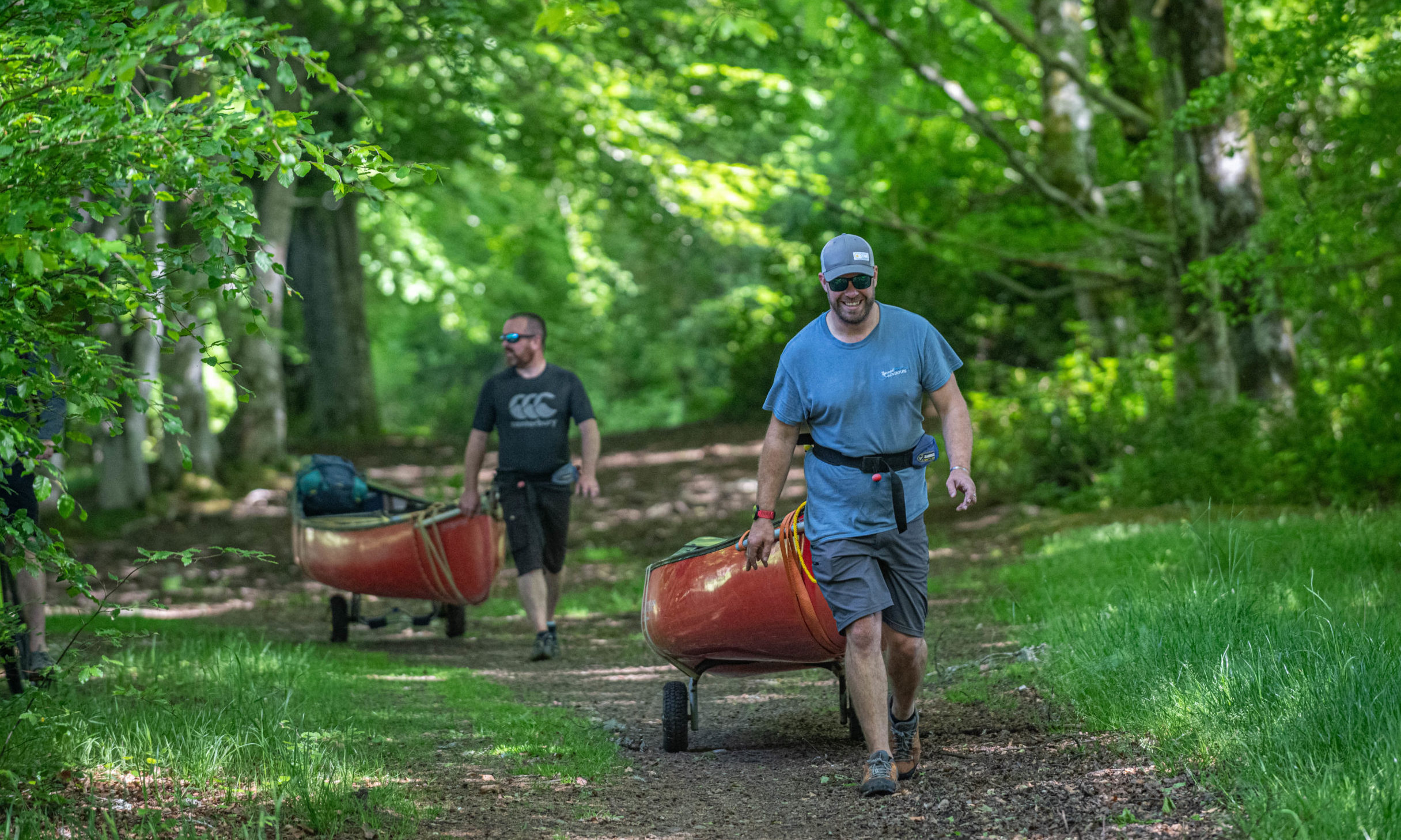 Mark French and Ross Dempster of Beyond Adventure take their canoes for a hike in aid of local causes
