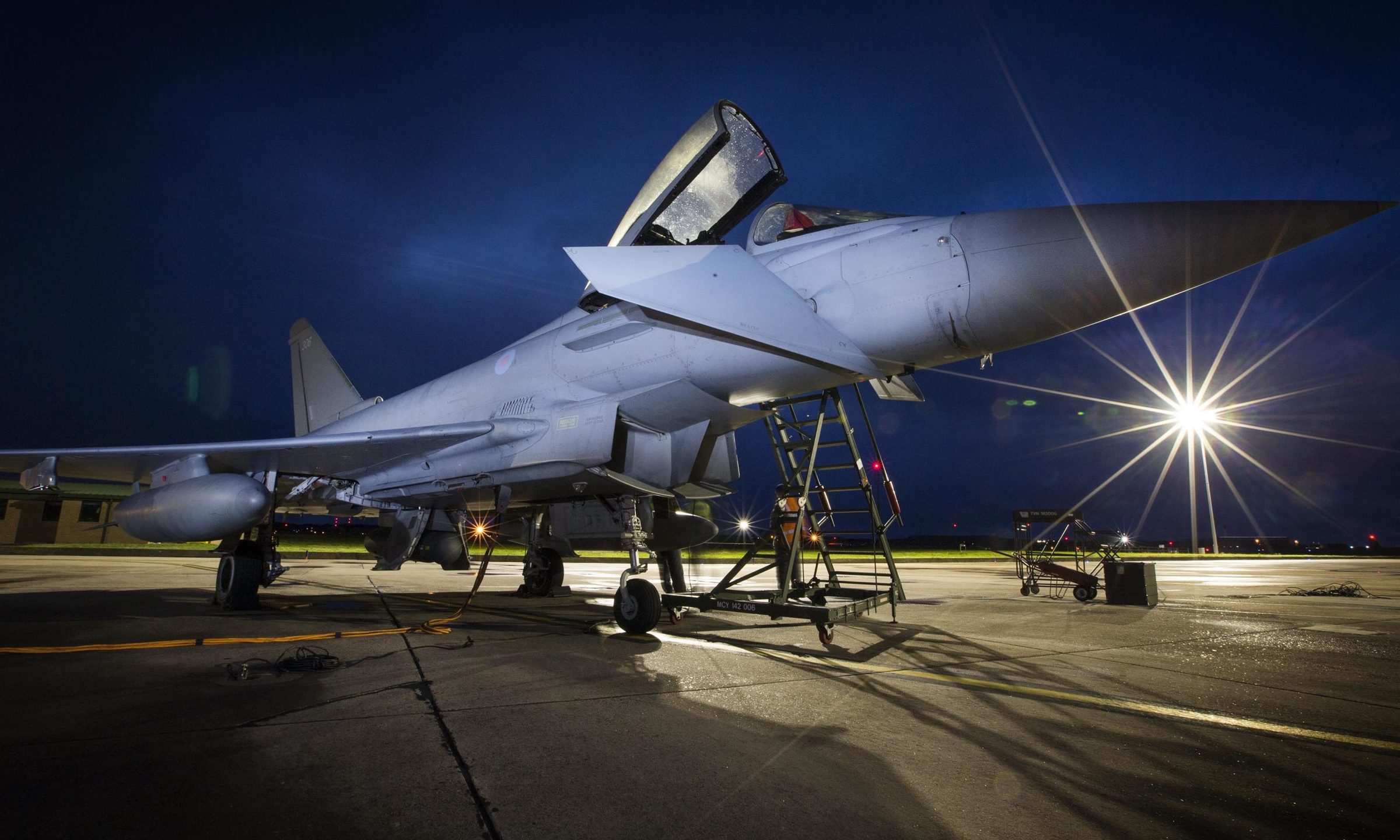 Eurofighter Typhoons taking part in a night-flying exercise.