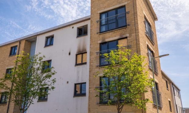 A flat on Monart Road was left as an "empty shell" after the blaze