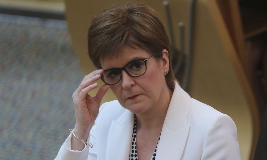 https://wpcluster.dctdigital.com/thecourier/wp-content/uploads/sites/12/2020/05/Nicola-Sturgeon-MSP-First-Ministers-Questions-FMQs-Scottish-Politics_35493906-e1590593016618-940x564.jpg