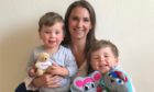 Sarah Bloice with her two sons, four-year-old Harry with puppets Mifu and Tina and two-year-old Charlie with puppet Caramelo Bear.