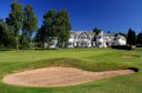 The 18th green of Rosemount and the Blairgowrie clubhouse.