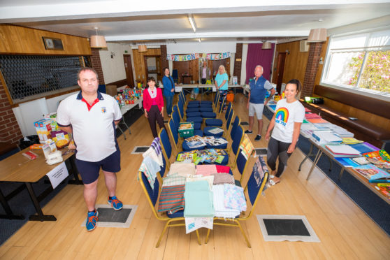 Picture shows, clockwise, left to right, members and volunteers, Willie Donaldson, Bronia Minchin, Susanne Burton, Eric Galloway, Pat Lockerbie, John Cunningham, Denise Anderson. Blairgowrie Bowling Club.