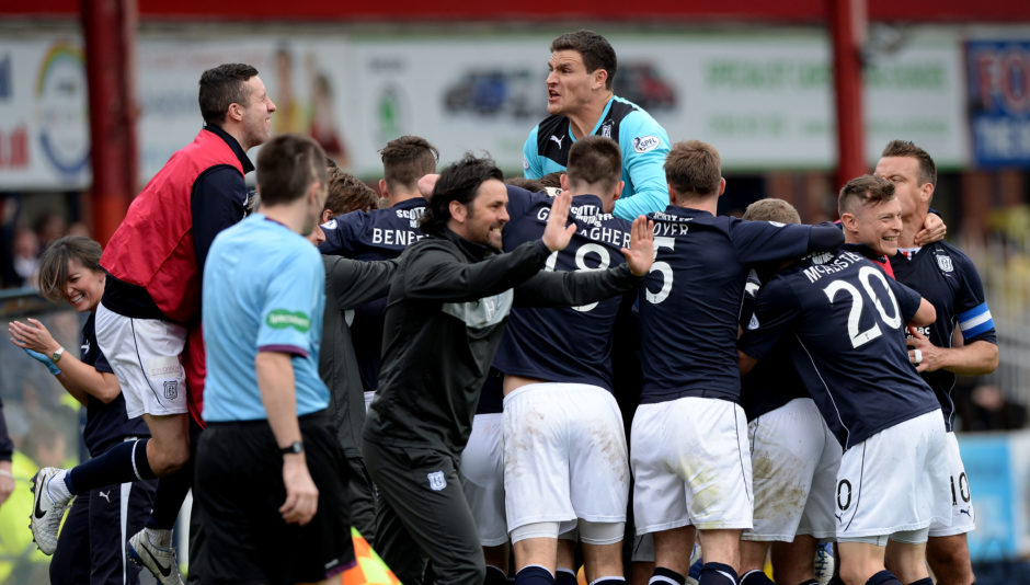 Dundee squad celebrates title triumph