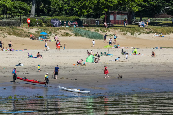 Canoeists take to the water off Silversands Beach in Aberdour.
