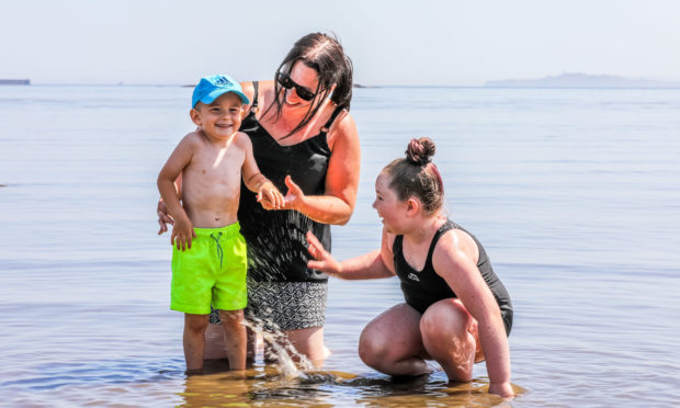 Courier News - All Editions - Gemma Bibby - Post Lockdown Happy Family stuff - CR0021587 - Aberdour - Picture Shows: Mum Nikki Mayne with Jack Reid (4) and Sophie Mayne (9) from Rosyth enjoying time on Silversands beach, Aberdour - Friday 29th May 2020 - Steve Brown / DCT Media