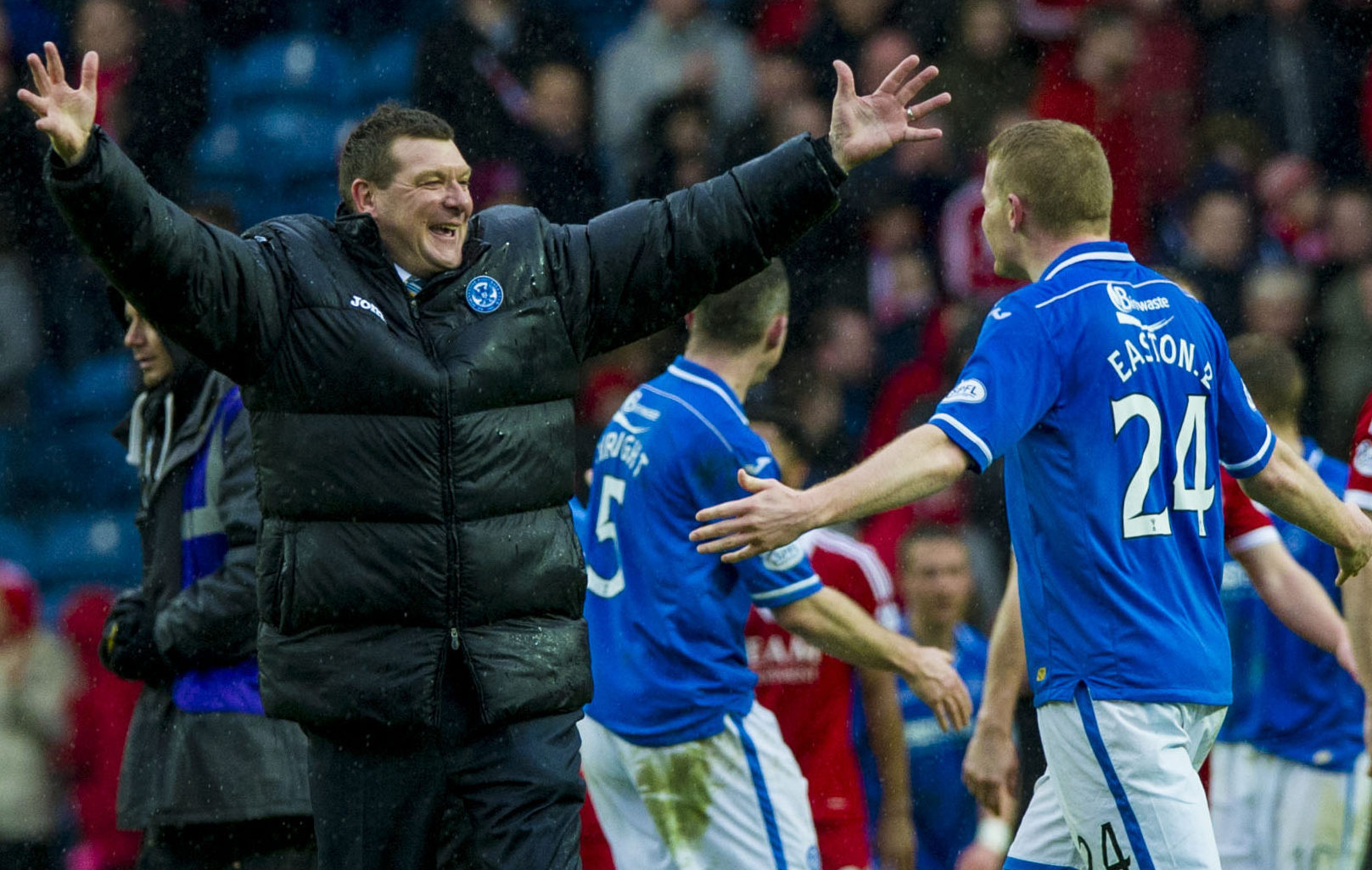 Tommy Wright celebrates getting to the Scottish Cup final with Brian Easton.