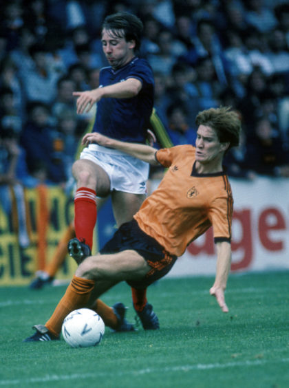 Ray Stephen up against Richard Gough in 1984