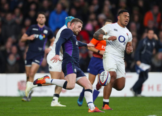 Finn Russell kicks during the second half of the Calcutta Cup game in 2019, something he did a lot more than the myth suggests.