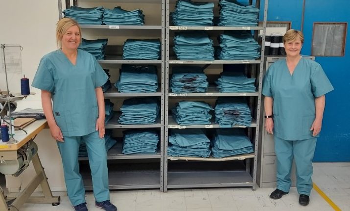 Tracey Caldwell (left) and Thelma Baxter from Tayside Linen Services with some of the Tayside Teal scrubs