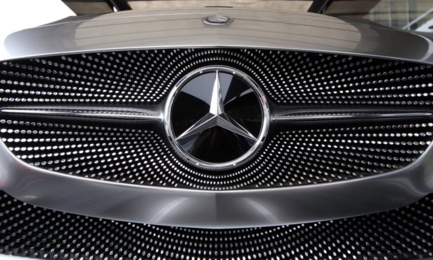 Stock photo of the Mercedes badge.