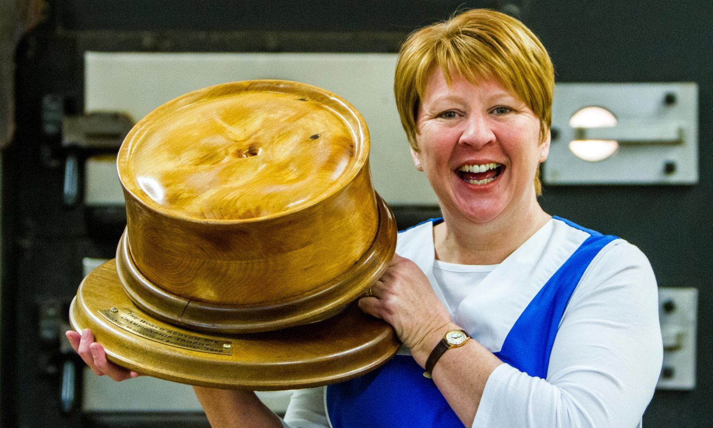 Linda Hill, of Murrays, with the trophy for winning the World Scotch Pie Championships.