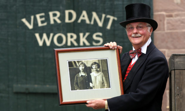 Verdant Works, Dundee.   Earl Scott picked up family resource leaflet and was amazed to see his mother on front. Pictured, Earl Scott with the enlarged original picture. His mother is the woman on the right.
