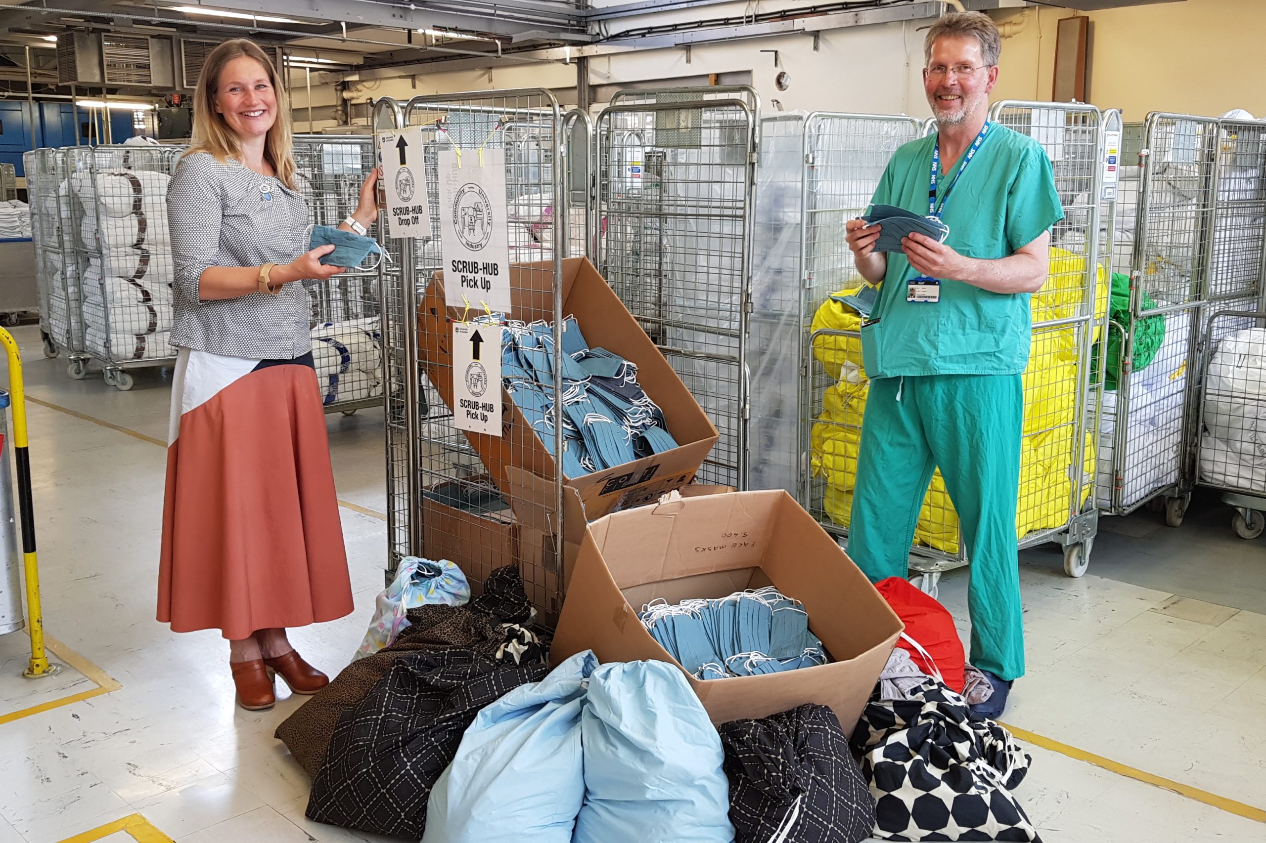 Consultant surgeon Rodney Mountain received the face coverings from Jane Keith of Duncan of Jordanstone College of Art and Design Textiles Department